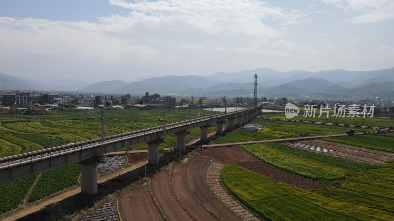 航拍高铁乡村铁路桥与田园风光