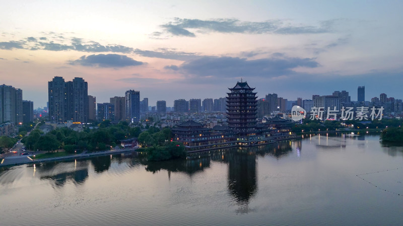 航拍眉山日落晚霞眉山远景楼摄影图