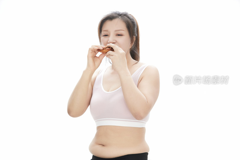 因暴饮暴食导致身材走样的亚洲女士