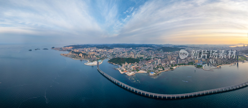 航拍大连城市海岸线清晨全景