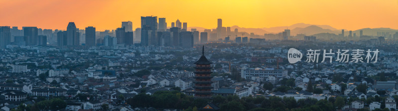 航拍夕阳下苏州古城区北寺塔高新区同框