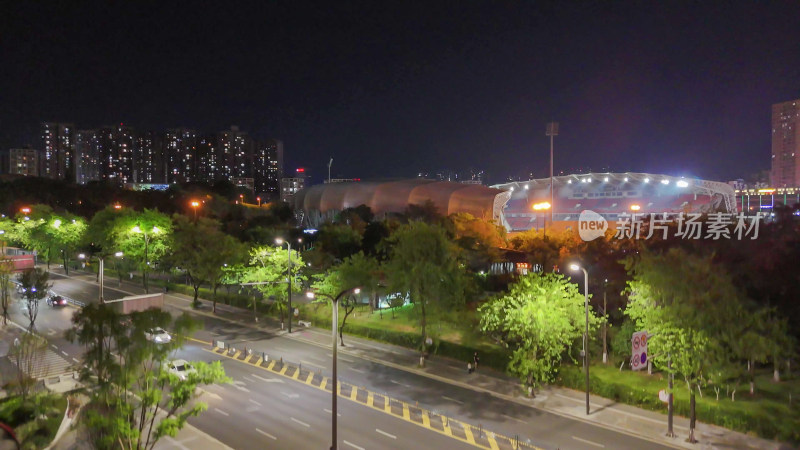 四川自贡南湖体育中心夜景摄影图