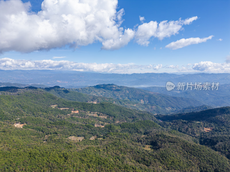 航拍蓝天白云下的景迈山山脉自然风光