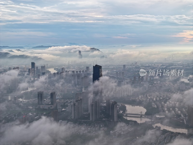 浙江湖州地标云雾缭绕的城市高空鸟瞰全景