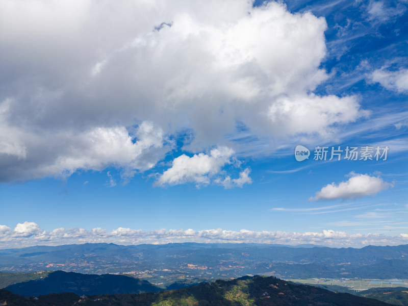 航拍蓝天白云下的景迈山山脉自然风光