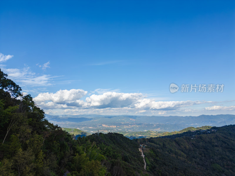 航拍蓝天白云下的景迈山山脉自然风光