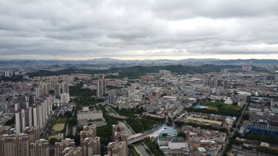 航拍广东省东莞市清溪镇风雨欲来城市风光