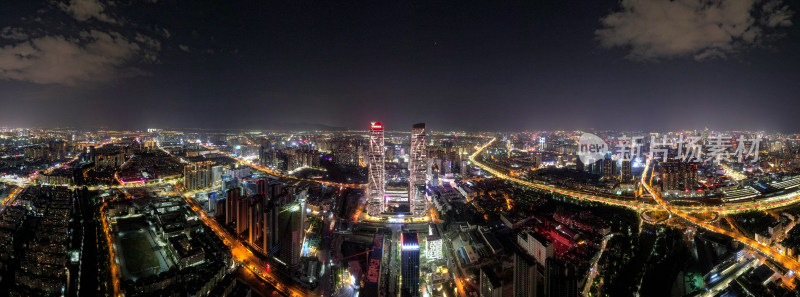 云南昆明双子塔夜景地标建筑航拍全景图