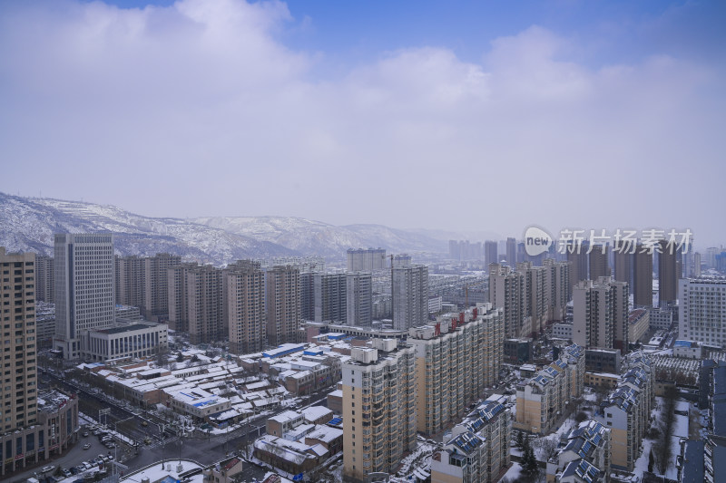 冬季城市雪景俯瞰高楼林立全景