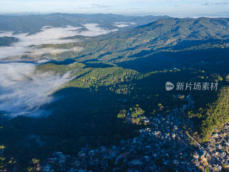 航拍景迈山云海环绕的古寨村庄自然风光