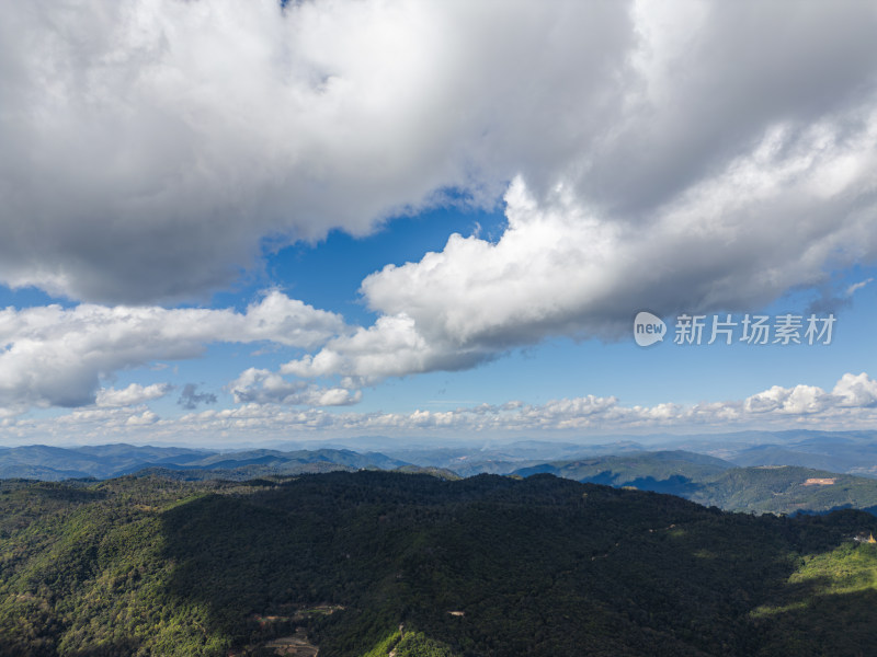 航拍蓝天白云下的景迈山山脉自然风光