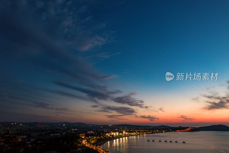 海边日落晚霞蓬莱八仙过海夜景航拍摄影图