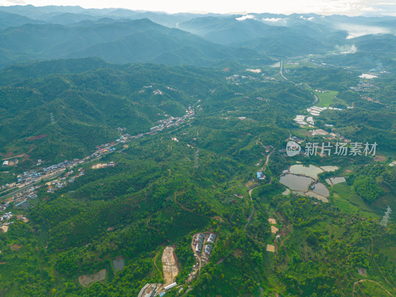 航拍天空高山农田田园村寨风光