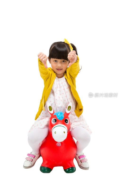 棚拍小女孩骑小马
