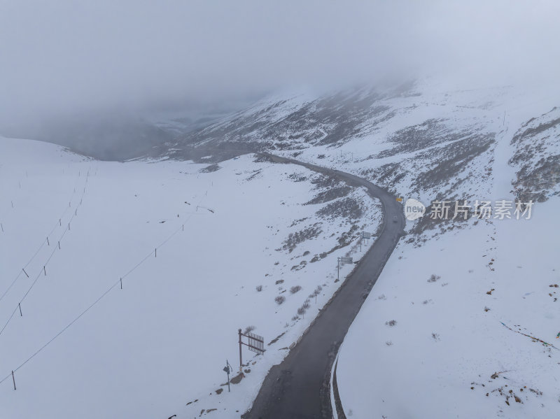 西藏林芝地区鲁朗小镇雪景高空航拍