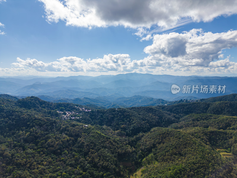 航拍蓝天白云下的景迈山山脉自然风光