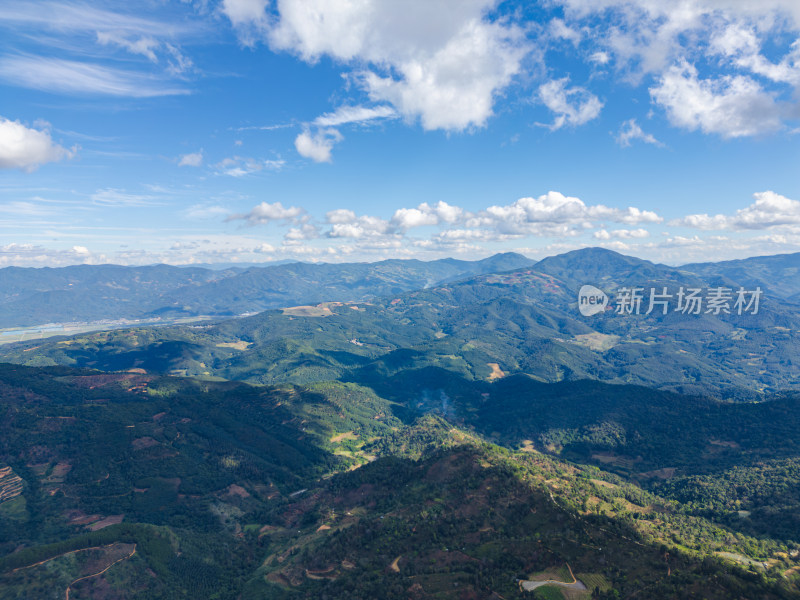 航拍蓝天白云下的景迈山山脉自然风光