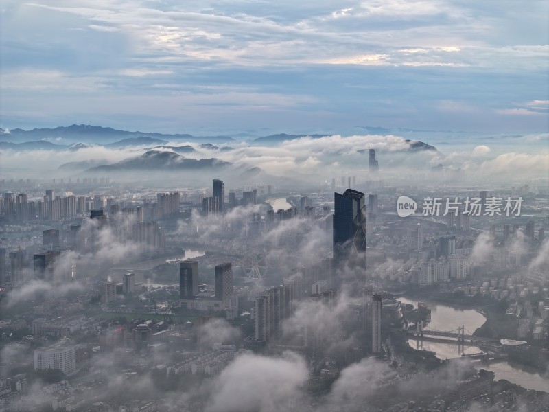 浙江湖州地标云雾缭绕的城市高空鸟瞰全景