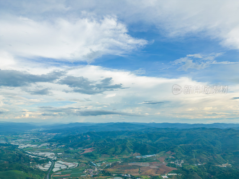 航拍天空高山农田田园村寨风光