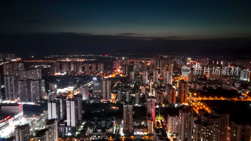 广西来宾城市高楼建筑夜景灯光航拍图