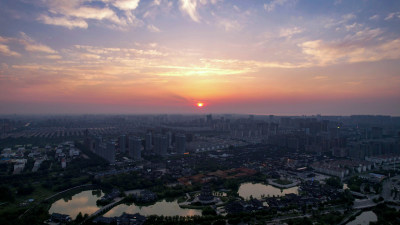 江苏宿迁城市日落晚霞夕阳西下航拍图