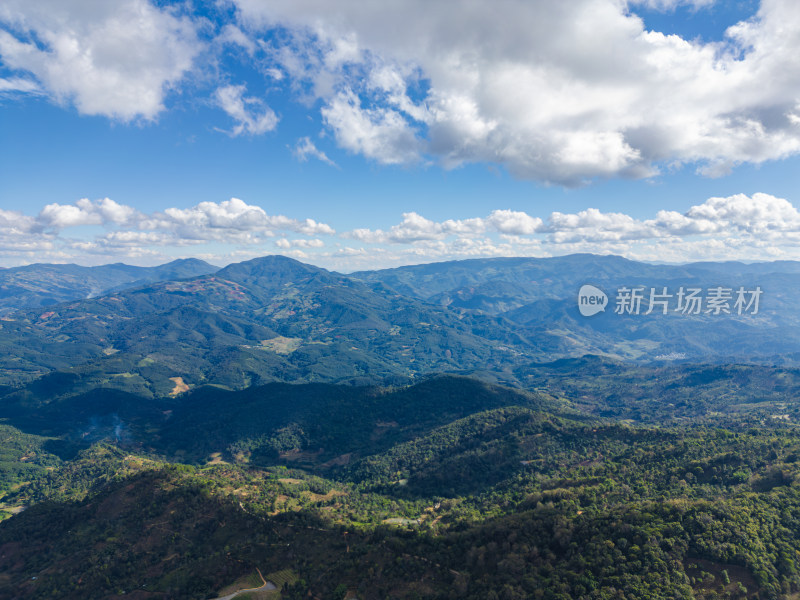 航拍蓝天白云下的景迈山山脉自然风光