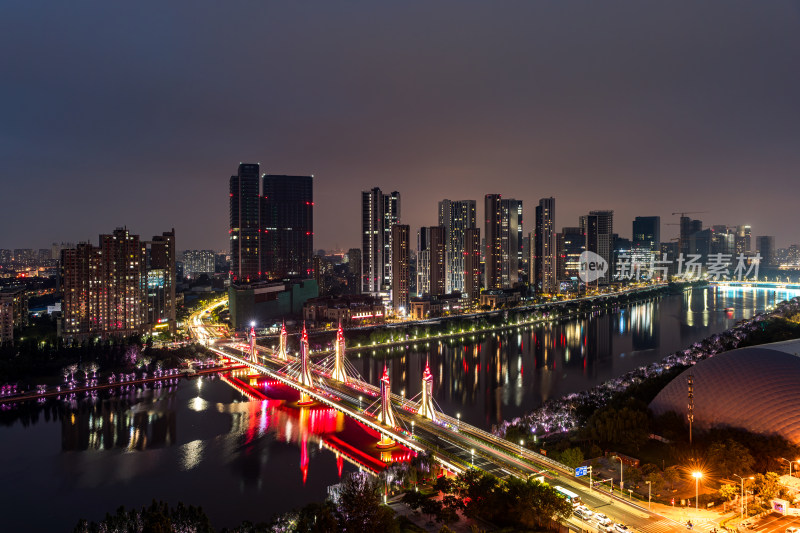 北京通州夜景下城市河流与桥梁及高楼全景