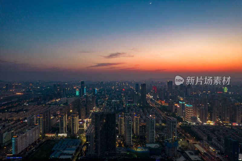 山东日照城市夜幕降临夜景灯光晚霞航拍