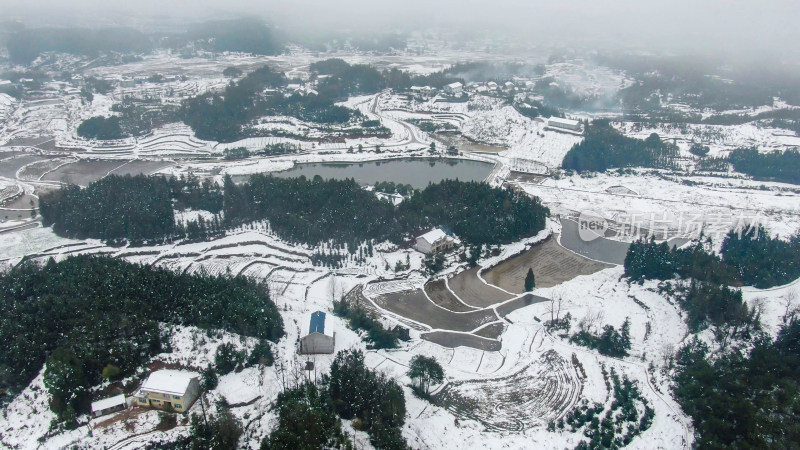 航拍冬天山区农田雪景