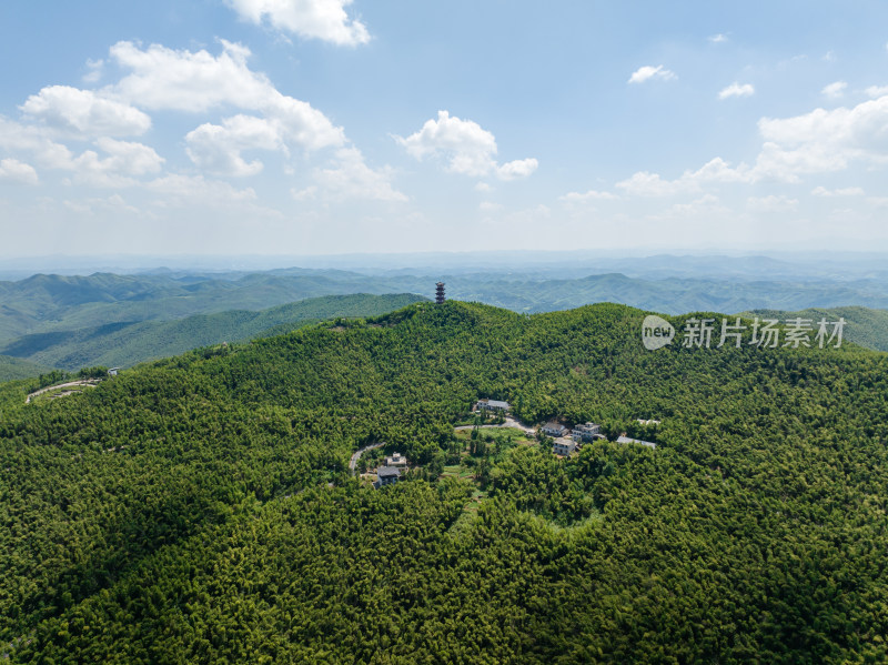 蓝天白云下航拍蔡伦竹海、层峦叠嶂的远山