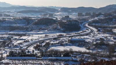 航拍威海市环翠区华夏景区冬季雪景