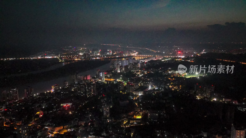 四川乐山万家灯火城市夜景航拍图