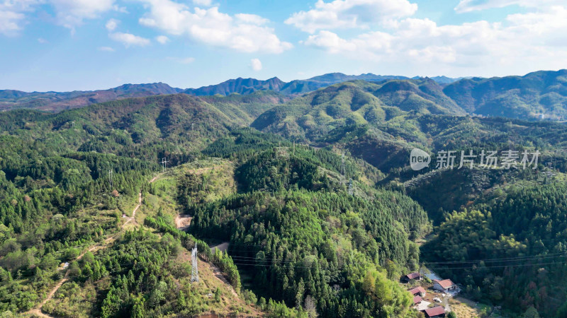 连绵起伏山川丘陵蓝天白云航拍