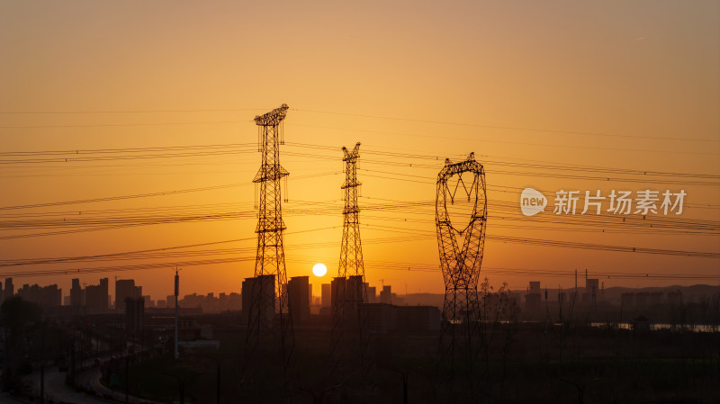夕阳落日电塔电线电业电力自然风景