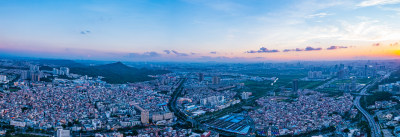 航拍广州番禺城市建筑景观夕阳晚霞全景长图