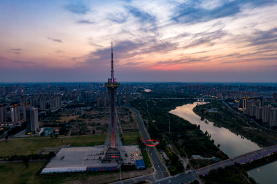 河南周口城市晚霞夜幕降临航拍图