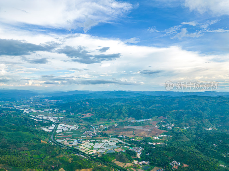 航拍天空高山农田田园村寨风光