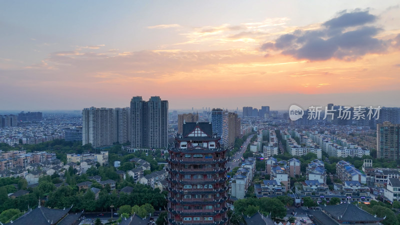 航拍眉山日落晚霞眉山远景楼摄影图