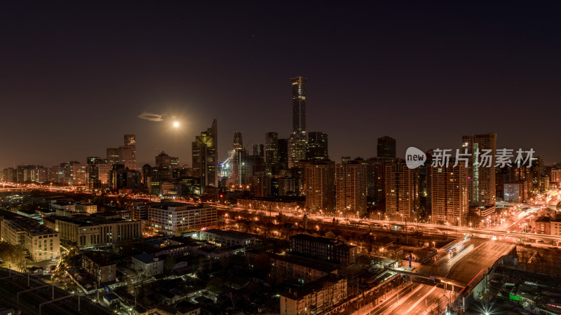 北京月光下灯火辉煌的城市夜景俯瞰图