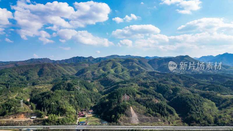 连绵起伏山川丘陵蓝天白云航拍