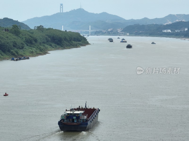 航拍货船行驶在西江之上广西梧州山水