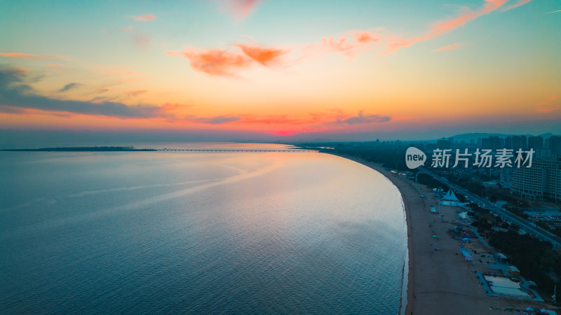 航拍视角烟台海岸线高楼大厦