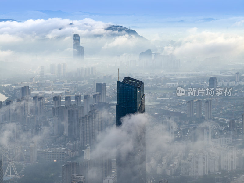 浙江湖州地标云雾缭绕的城市高空鸟瞰全景