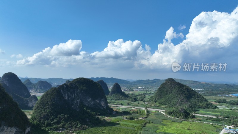 航拍广西喀斯特地貌山脉夏日晴空蓝天白云