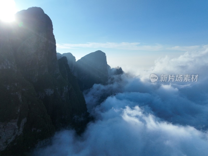 航拍云层之上大山山顶漏光唯美风景圣堂山