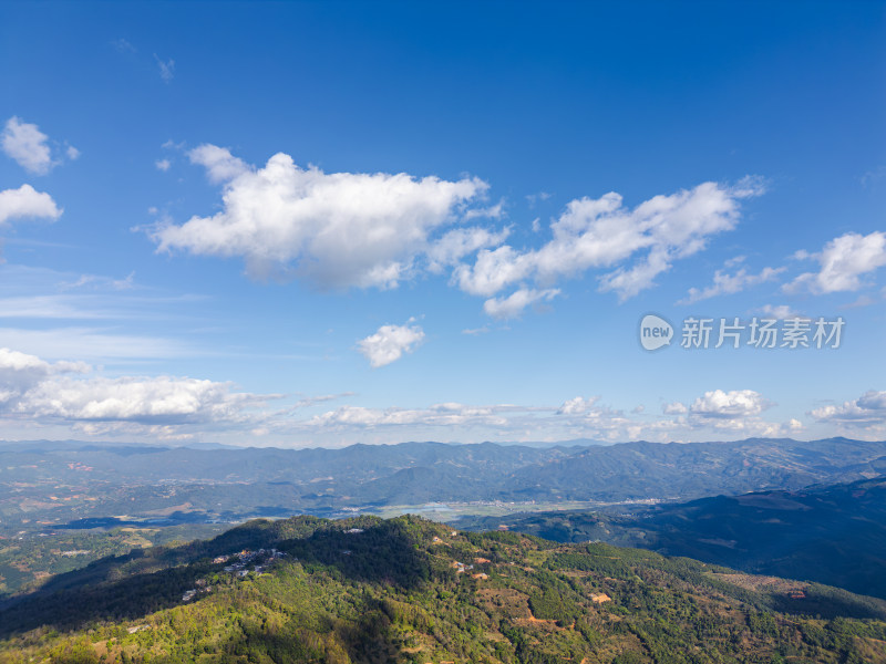 航拍蓝天白云下的景迈山山脉自然风光