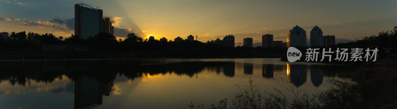 西双版纳城市黄昏倒影全景