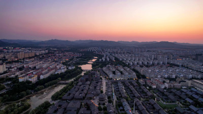 城市日落晚霞夕阳西下山东青州航拍图