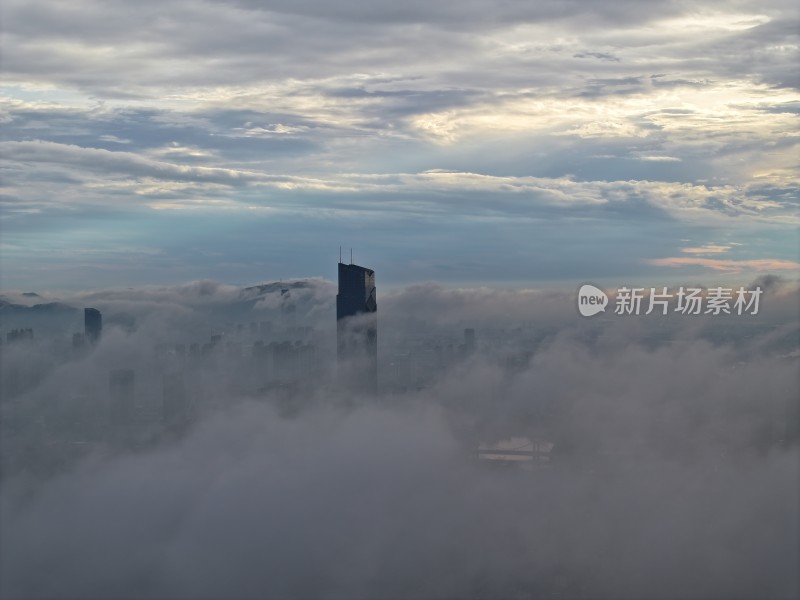 浙江湖州地标云雾缭绕的城市高空鸟瞰全景