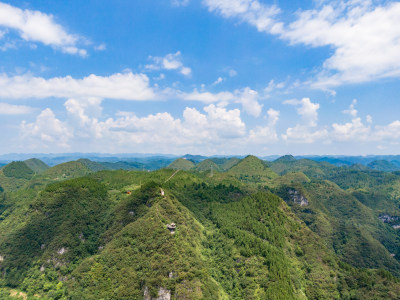 大自然连绵起伏山川丘陵蓝天白云航拍图